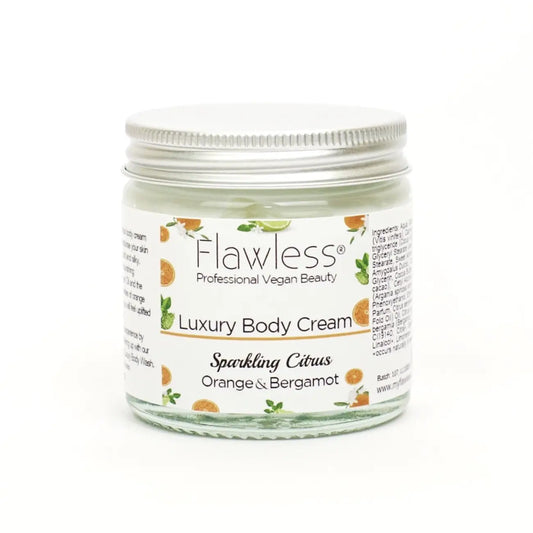 Luxury Body Cream with Orange and Bergamot in glass jar.