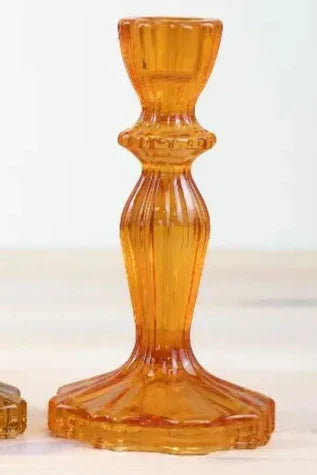 Orange glass candle holder, 15.8cm tall, with a tapered design.