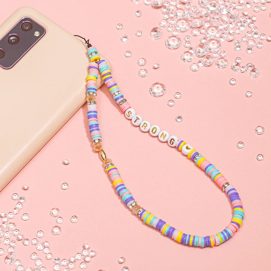 Colourful phone strap with "Strong" affirmation beads.
