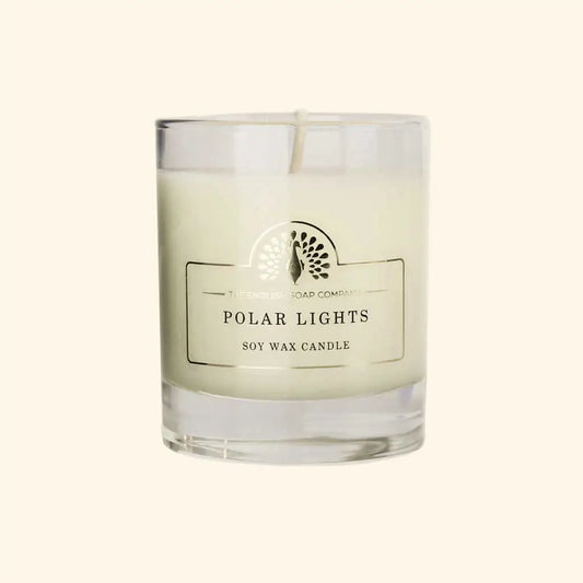 Polar Lights Scented Candle with uplifting zesty lemon, mandarin, and pineapple aroma in a clear glass jar.