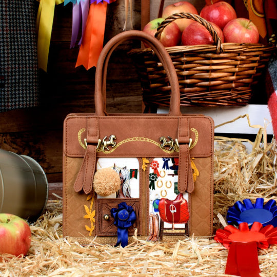 stylish vegan leather pony club handbag with structured design.