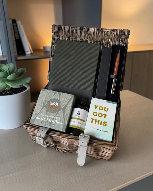 Productivity gift set with notebook, personalised pen, energy tea, quote cards and chocolate truffles.