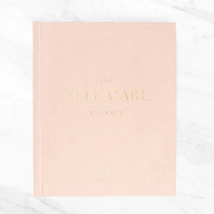 Deluxe Self-Care Journal with guided prompts for mindfulness and reflection.