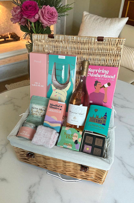 surviving motherhood gift for mums with whispering angel and self care items