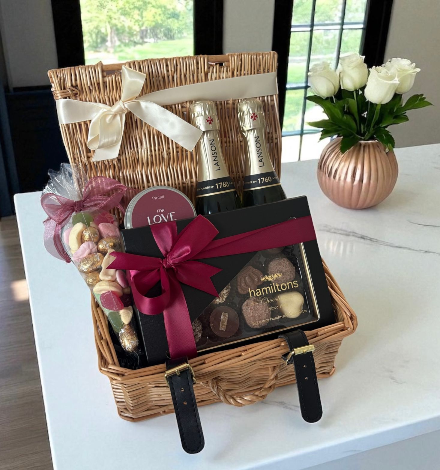 Luxury gift with champagne, chocolates and sweets