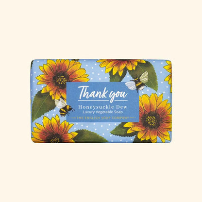 Soap bar with sunflower design and 'Thank you' text on a blue background