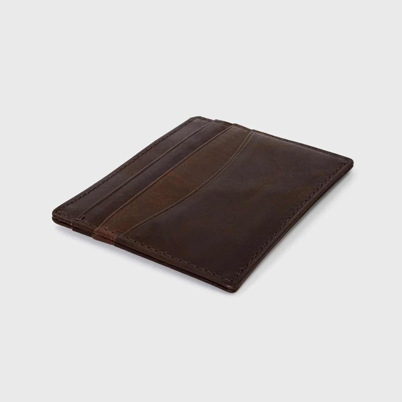 Vintage leather card holder in brown with seven slots, slimline and personalized.