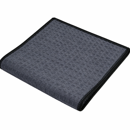Gray textured waffle cloth on a white background