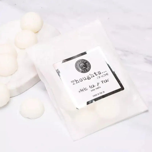 Vegan wax melts silver with white tea and pear scent.