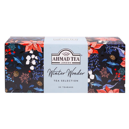 Ahmad Tea Winter Selection Pack with 30 teabags of English Breakfast, Cinnamon Haze and Chai Spice in a festive winter-themed box.