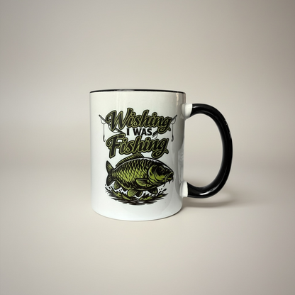 Mug with 'Wishing I Was Fishing' text and fish illustration on a beige background