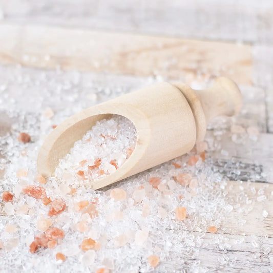 Wooden Bath Salt Scoop made from eco-friendly materials on salt.